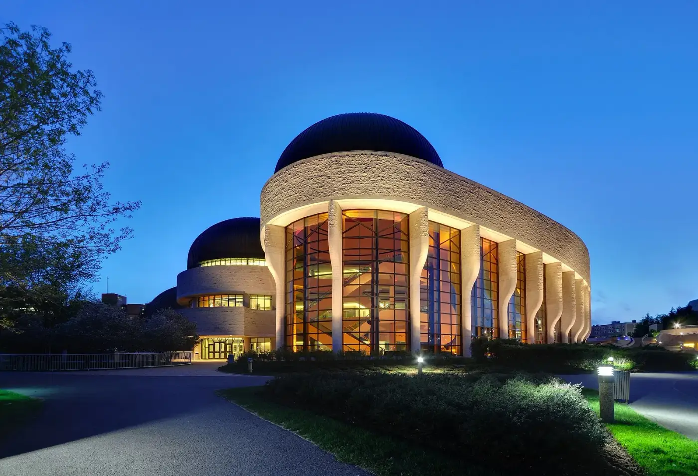 Canadian Museum of History lit at dusk on the Gatineau waterfront